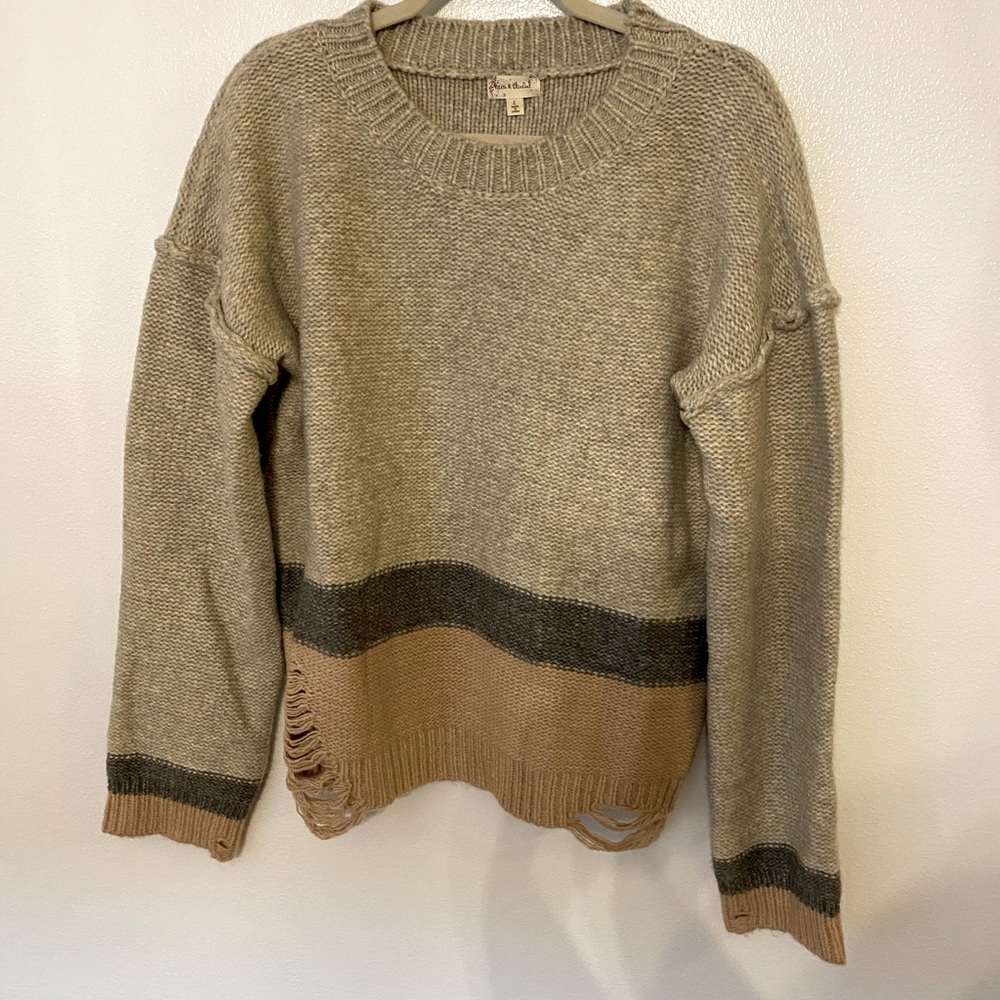 Multicolored wool sweater with distressing